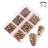 Une boite de strass en verre de cristal pour ongles, de toutes les couleurs. Strass à coller sur les ongles ou les faux, pour un joli nail art. couleur doré