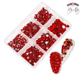 Une boite de strass en verre de cristal pour ongles, de toutes les couleurs. Strass à coller sur les ongles ou les faux, pour un joli nail art. couleur rouge.